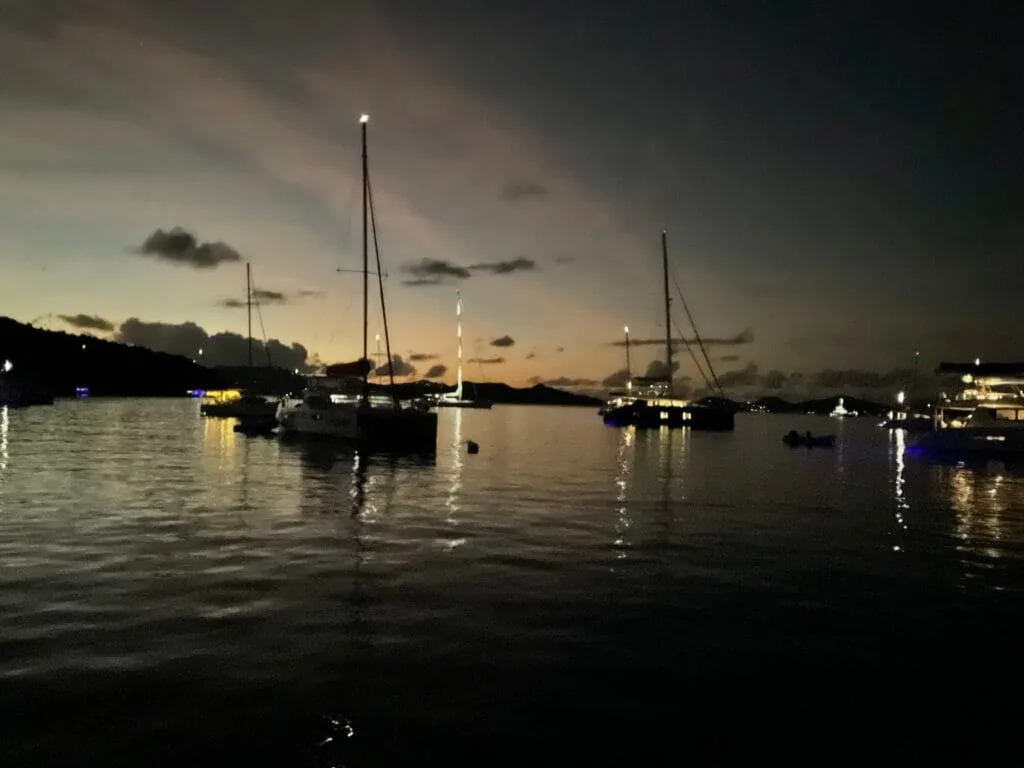 night view of boat masts